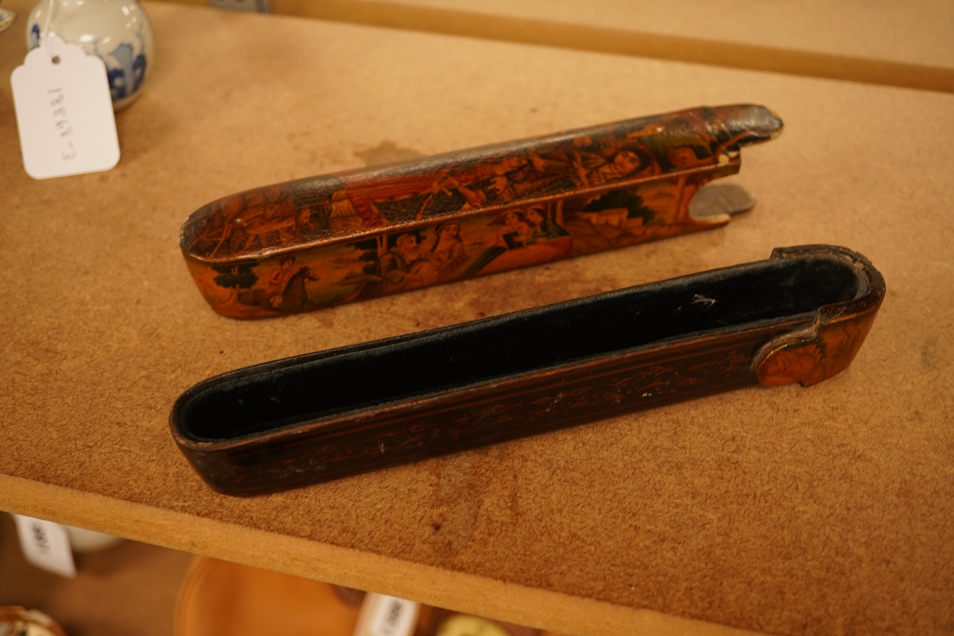 A 19th century Persian scribe’s pen box (qalamdan), 22.5cm long